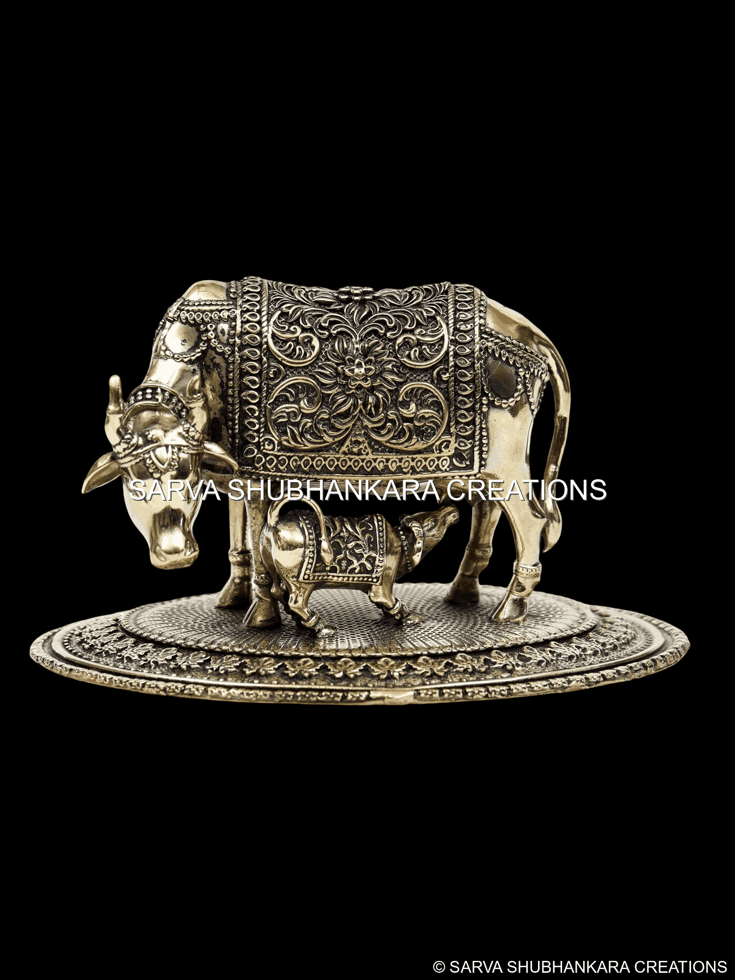 Cow with Calf on Decorative Base